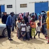 Người tị nạn tại một trung tâm giam giữ ở Tripoli, Libya ngày 4/4/2019. (Ảnh: AFP/TTXVN)