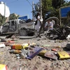 Hiện trường vụ đánh bom xe do phiến quân Taliban tiến hành tại tỉnh Herat. (Ảnh: AFP/TTXVN)