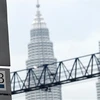 Logo Quỹ 1MDB tại điểm giao dịch ngoại hối Tun Razak ở Kuala Lumpur ngày 8/7/2015. (Ảnh: AFP/TTXVN)