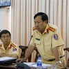Thượng tá Nguyễn Ngọc Hiệp, Phó trưởng phòng phụ trách Phòng Cảnh sát giao thông Công an thành phố Cần Thơ phát biểu tại hội nghị. (Ảnh: Thanh Liêm/TTXVN)