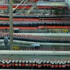 Dây chuyền sản xuất Coca-Cola đóng chai tại nhà máy Coca- Cola ở Grigny, gần Paris (Pháp). (Ảnh: AFP/ TTXVN)