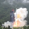 Tên lửa đẩy Trường Chinh-3B mang theo 2 vệ tinh Bắc Đẩu-3 rời bệ phóng ở Tứ Xuyên, Trung Quốc ngày 29/7. (Ảnh: THX/TTXVN)