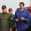 Tổng thống Venezuela Nicolas Maduro (giữa) phát biểu trong cuộc họp với các binh sĩ tại bang miền Trung Aragua, ngày 17/5. (Ảnh: AFP/TTXVN)