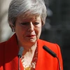 Thủ tướng Anh Theresa May bày tỏ hối tiếc vì không thực hiện được thỏa thuận Brexit (Ảnh: AFP/TTXVN)