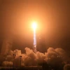 Tên lửa đẩy mang theo tàu vũ trụ rời bệ phóng ở căn cứ không quân Vandenberg, bang California, Mỹ ngày 5/5/2018. (Ảnh: AFP/TTXVN)