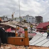 Hiện trường vụ sập nhà ở Preah Sihanouk, Campuchia, ngày 22/6/2019. (Ảnh: THX/ TTXVN)