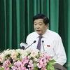 Chủ tịch Hội đồng Nhân dân tỉnh Vĩnh Long Bùi Văn Nghiêm phát biểu tại kỳ họp. (Ảnh: Phạm Minh Tuấn/TTXVN)