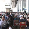 Khu vực đón khách sân ga quốc tế của Sân bay Tân Sơn Nhất. (Ảnh: Xuân Khu/TTXVN)