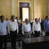 Các bị cáo nguyên là lãnh đạo Tập đoàn Cao su Việt Nam nghe tuyên đọc bản án chiều 6/8/2019. (Ảnh: Thành Chung/TTXVN)