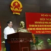 Ủy viên Trung ương Đảng, Bộ trưởng Bộ Nội vụ Lê Vĩnh Tân phát biểu khai mạc hội nghị. (Ảnh: Văn Điệp/TTXVN)