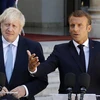 ổng thống Pháp Emmanuel Macron (phải) và Thủ tướng Anh Boris Johnson tại cuộc họp báo ở Paris ngày 22/8/2019. (Ảnh: THX/TTXVN)