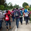 Người di cư Trung Mỹ tại Tapachula, bang Chiapas, Mexico, ngày 12/4, trong hành trình tới Mỹ. (Ảnh: AFP/TTXVN)