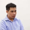 Bị cáo Nguyễn Trọng Trình khai báo trước tòa. (Ảnh: Doãn Tấn/TTXVN)