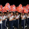 Các em học sinh tham gia rước đèn trong Lễ hội rước đèn Trung thu Phan Thiết 2019. (Ảnh: Nguyễn Thanh/TTXVN)