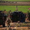 Đoàn xe quân sự Mỹ ở gần làng Yalanli, ngoại ô phía tây thành phố Manbij, Syria. (Ảnh: AFP/TTXVN)