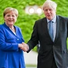 Thủ tướng Đức Angela Merkel (trái) và Thủ tướng Anh Boris Johnson trong cuộc gặp tại Berlin ngày 21/8/2019. (Ảnh: THX/ TTXVN)