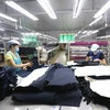 Các dây chuyền dệt may của Công ty Cổ phần dệt may Phú Hòa An tại Khu công nghiệp Phú Bài, tỉnh Thừa Thiên Huế. (Ảnh: Anh Tuấn/TTXVN)