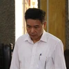 Bị cáo Trần Xuân Yến, nguyên Phó Giám đốc Sở Giáo dục và Đào tạo tỉnh Sơn La tại phiên tòa ngày 18/10. (Ảnh: Hữu Quyết/TTXVN)