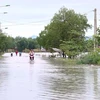 Nước ngập nhiều tuyến đường tại thị trấn Kiến Giang, huyện Lệ Thủy, tỉnh Quảng Bình. (Ảnh: Võ Dung-TTXVN)