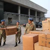 Lực lượng Bệnh viện dã chiến cấp 2 số 2 tập kết trang thiết bị chuẩn bị lên đường tham gia Gìn giữ hoà bình Liên hợp quốc. (Ảnh: Dương Giang/TTXVN)