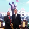Ông Lê Thanh Liêm, Phó Chủ tịch Thường trực UBND Thành phố Hồ Chí Minh (phải) tiếp ông Ly Vann Hong, Đặc phái viên Chính phủ Hoàng gia, Quốc vụ khanh Bộ Thông tin Vương quốc Campuchia. (Ảnh: Xuân Khu/TTXVN)
