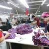 Các dây chuyền dệt may của công ty Cổ phần dệt may Phú Hòa An tại KCN Phú Bài, tỉnh Thừa Thiên Huế. (Ảnh: Anh Tuấn/TTXVN)