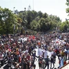 Người dân tham gia biểu tình phản đối Chính phủ tại Santiago, Chile, ngày 23/10/2019. (Ảnh: AFP/ TTXVN)