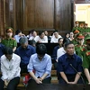 Các bị cáo tại phiên tòa ngày 15/11. (Ảnh: Thành Chung/TTXVN)
