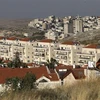Quang cảnh khu định cư ở Đông Jerusalem (phía trước). (Ảnh: AFP/TTXVN)