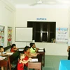 Một giờ học của học sinh lớp ghép trên đảo Song Tử Tây. (Ảnh: Trần Quang Vinh/TTXVN)