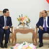Thủ tướng Nguyễn Xuân Phúc tiếp Bộ trưởng Bộ Ngoại giao Lào Saleumxay Kommasith đang thăm chính thức Việt Nam. (Ảnh: Thống Nhất/TTXVN)