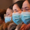 Nhân viên y tế từ thành phố Thượng Hải tham dự khóa đào tạo về dịch bệnh phổi do virus corona mới gây ra tại Vũ Hán, tỉnh Hồ Bắc, Trung Quốc, ngày 25/1. (Ảnh:THX/TTXVN)
