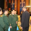 Đại tướng Ngô Xuân Lịch với các đại biểu tại Hội nghị hẹp Bộ trưởng Quốc phòng ASEAN. (Ảnh: Dương Giang/TTXVN)