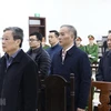 Bị cáo Nguyễn Bắc Son (cựu Bộ trưởng Bộ Thông tin và Truyền thông) nghe tòa tuyên án trong phiên xử ngày 7/1. (Ảnh: Văn Điệp/TTXVN)