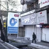 Cảnh vắng vẻ, ảm đạm do dịch COVID-19 tại một tuyến phố ở Tehran, Iran ngày 20/3/2020. (Ảnh: THX/TTXVN)