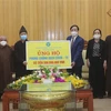 Giáo hội Phật giáo Việt Nam tỉnh Hà Nam ủng hộ 500 triệu đồng cho công tác phòng, chống dịch bệnh COVID-19. (Ảnh: Nguyễn Chinh/TTXVN)