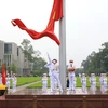 Quốc kỳ tung bay trong tiếng Tiến quân ca trên Quảng trường Ba Đình. (Ảnh: Thành Đạt/TTXVN)