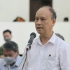 Bị cáo Trần Văn Minh, cựu Chủ tịch UBND thành phố Đà Nẵng khai báo trước tòa. (Ảnh: Doãn Tấn/TTXVN)