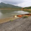 Vỡ đập Đầm Thìn, huyện Cẩm Khê (Phú Thọ). (Ảnh: Tạ Toàn/TTXVN)