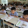 Học sinh lớp 1 trường Tiểu học Ninh Mỹ, huyện Hoa Lư, tỉnh Ninh Bình trong giờ học Tiếng Việt. (Ảnh minh họa: Hải Yến/TTXVN)