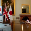 Bộ trưởng Thương mại Anh Liz Truss trò chuyện với Bộ trưởng Ngoại giao Nhật Bản Toshimitsu Motegi. (Nguồn: ft.com)
