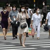 Người dân đeo khẩu trang phòng lây nhiễm COVID-19 tại Seoul, Hàn Quốc, ngày 23/6/2020. (Ảnh: AFP/TTXVN)