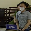 Bị cáo Nguyễn Quang Huy tại phiên tòa. (Ảnh: Thanh Bùi/TTXVN)