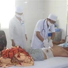 Bệnh nhân Nguyễn Văn Sớm được điều trị tại bệnh viện Đa khoa tỉnh Bạc Liêu. (Ảnh: Huỳnh Sử/TTXVN)