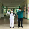 Bệnh nhân 1015, bệnh nhân cuối cùng điều trị tại Bệnh viện Phổi Đà Nẵng, được xuất viện. (Ảnh: TTXVN phát)
