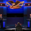 Cuộc tranh luận đầu tiên giữa đương kim Tổng thống Donald Trump (trái) và ứng cử viên Tổng thống đảng Dân chủ Joe Biden. (Ảnh: AFP/ TTXVN)
