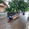Nhiều tuyến đường ở huyện Quảng Điền, Thừa Thiên-Huế bị ngập sâu. (Ảnh: TTXVN phát)