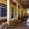 Trường học bị bùn đất bồi lấp tại Quảng Trị. (Ảnh: TTXVN phát)