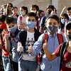 Học sinh đeo khẩu trang phòng lây nhiễm COVID-19 tại trường học ở Damascus, Syria, ngày 13/9/2020. (Ảnh: THX/TTXVN)