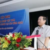 Đại sứ Việt Nam tại Lào Nguyễn Bá Hùng đang phát biểu tại Hội nghị. (Ảnh: Phạm Kiên/Vietnam+)